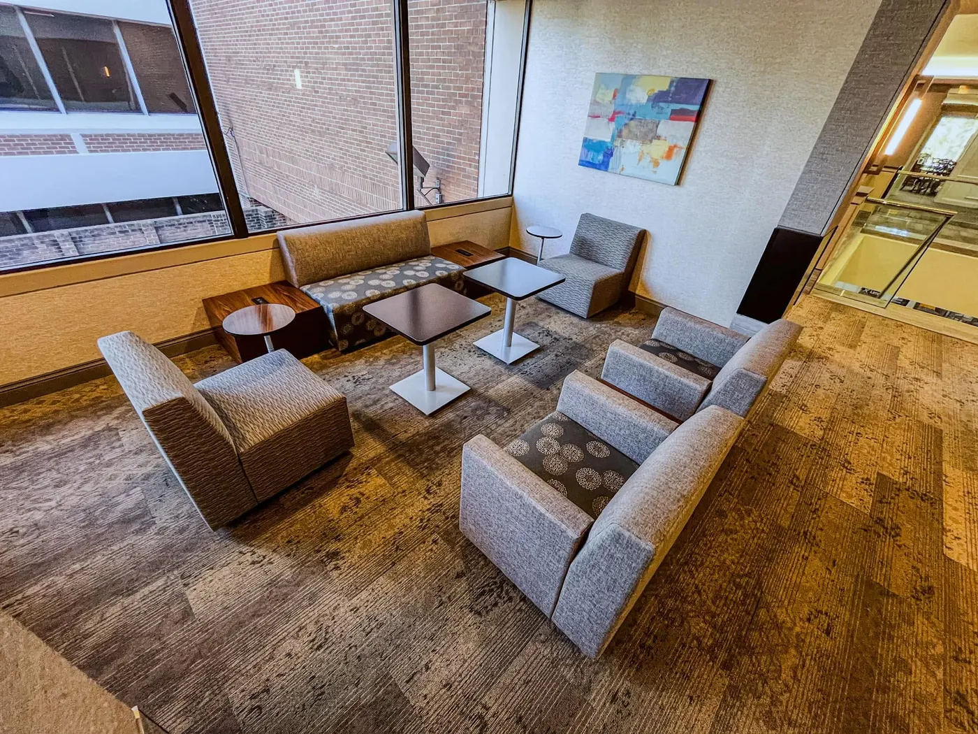 Office lounge seating area on commercial carpet