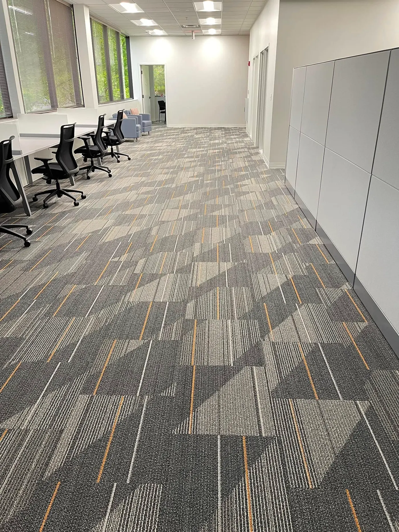 Open office with modern geometric carpet tile