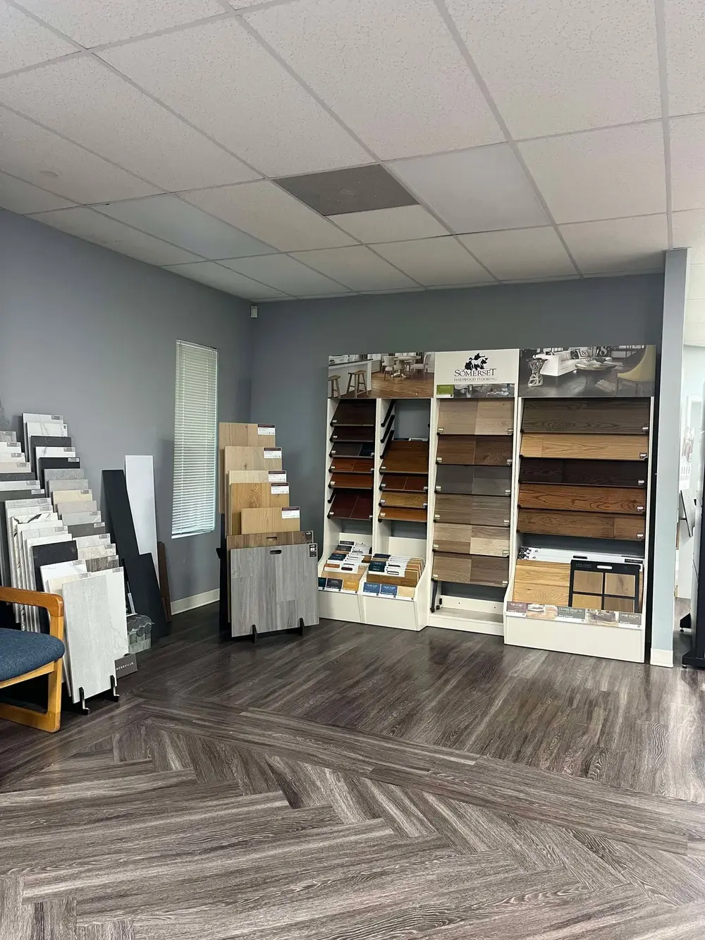 Hardwood and tile sample displays inside the Brothers Flooring showroom in Knoxville